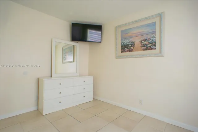 a room with cabinet with flat screen tv