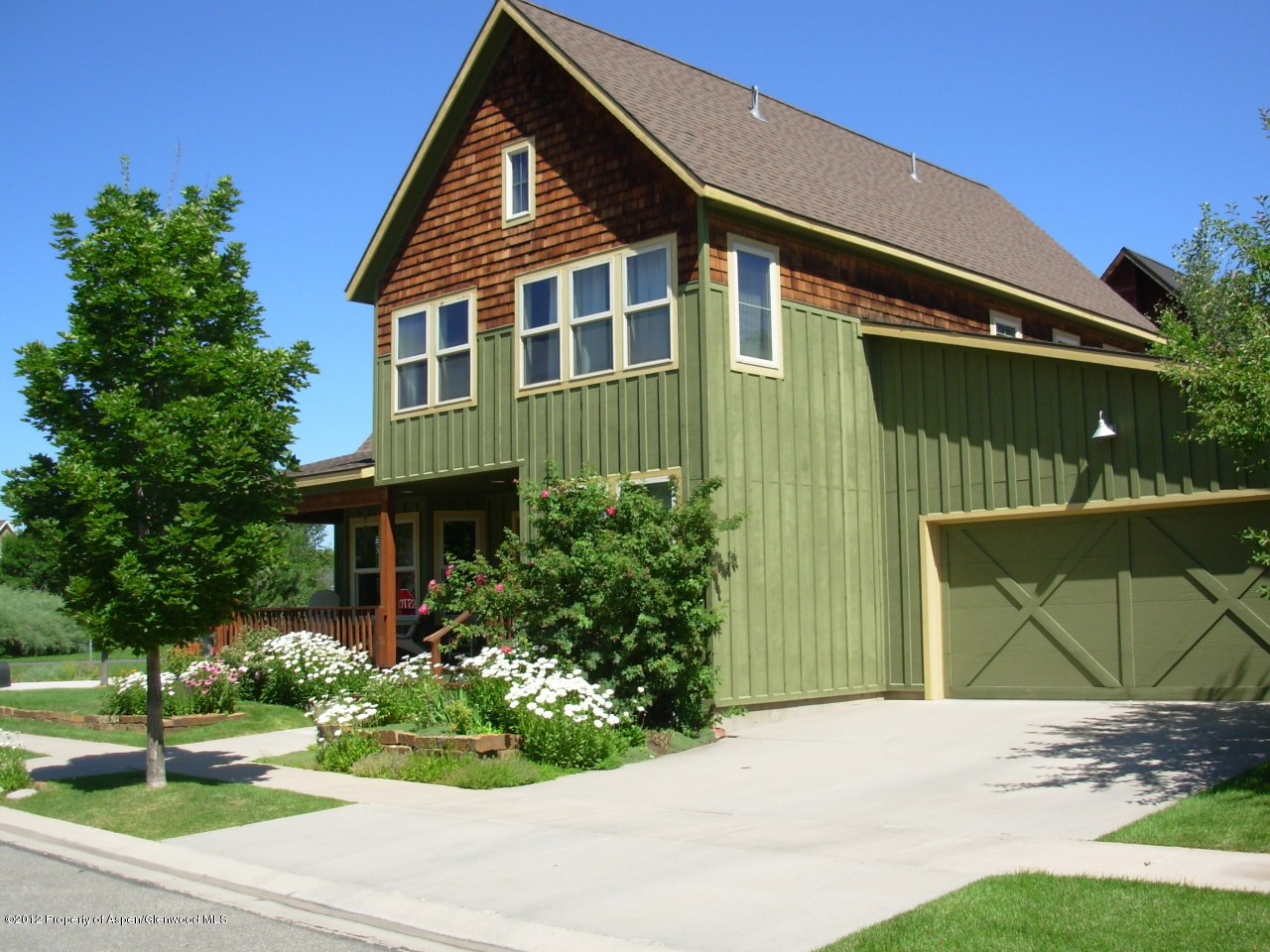 405 Meadow Court Basalt, CO 81621 - Photo 1 of 25 a front view of a house with a yard