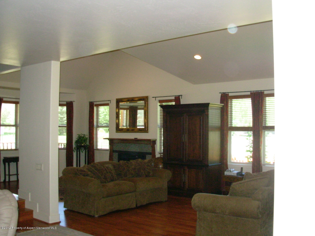 405 Meadow Court Basalt, CO 81621 - Photo 15 of 25 a living room with furniture and a window