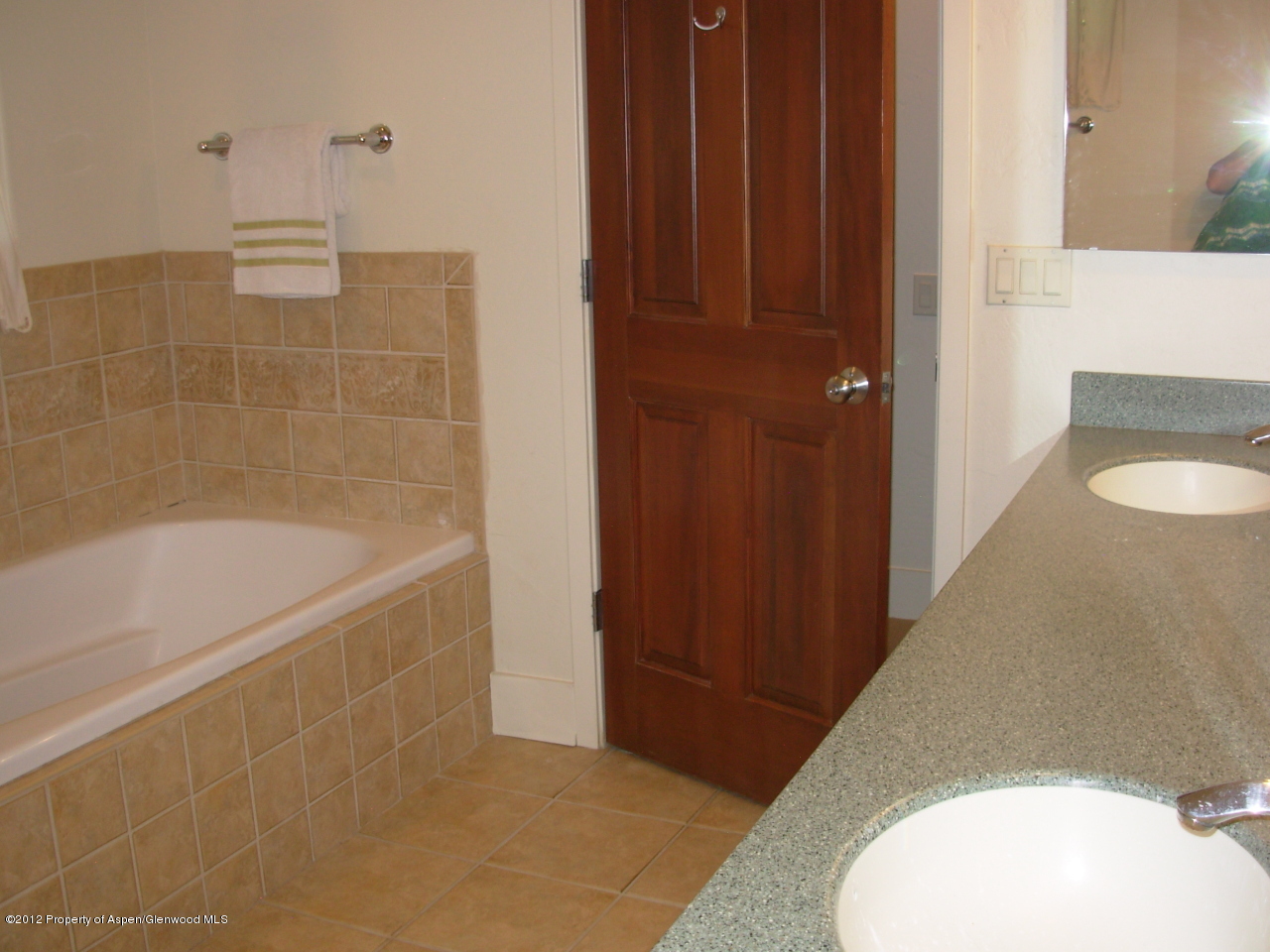 405 Meadow Court Basalt, CO 81621 - Photo 19 of 25 a bathroom with a sink and a mirror