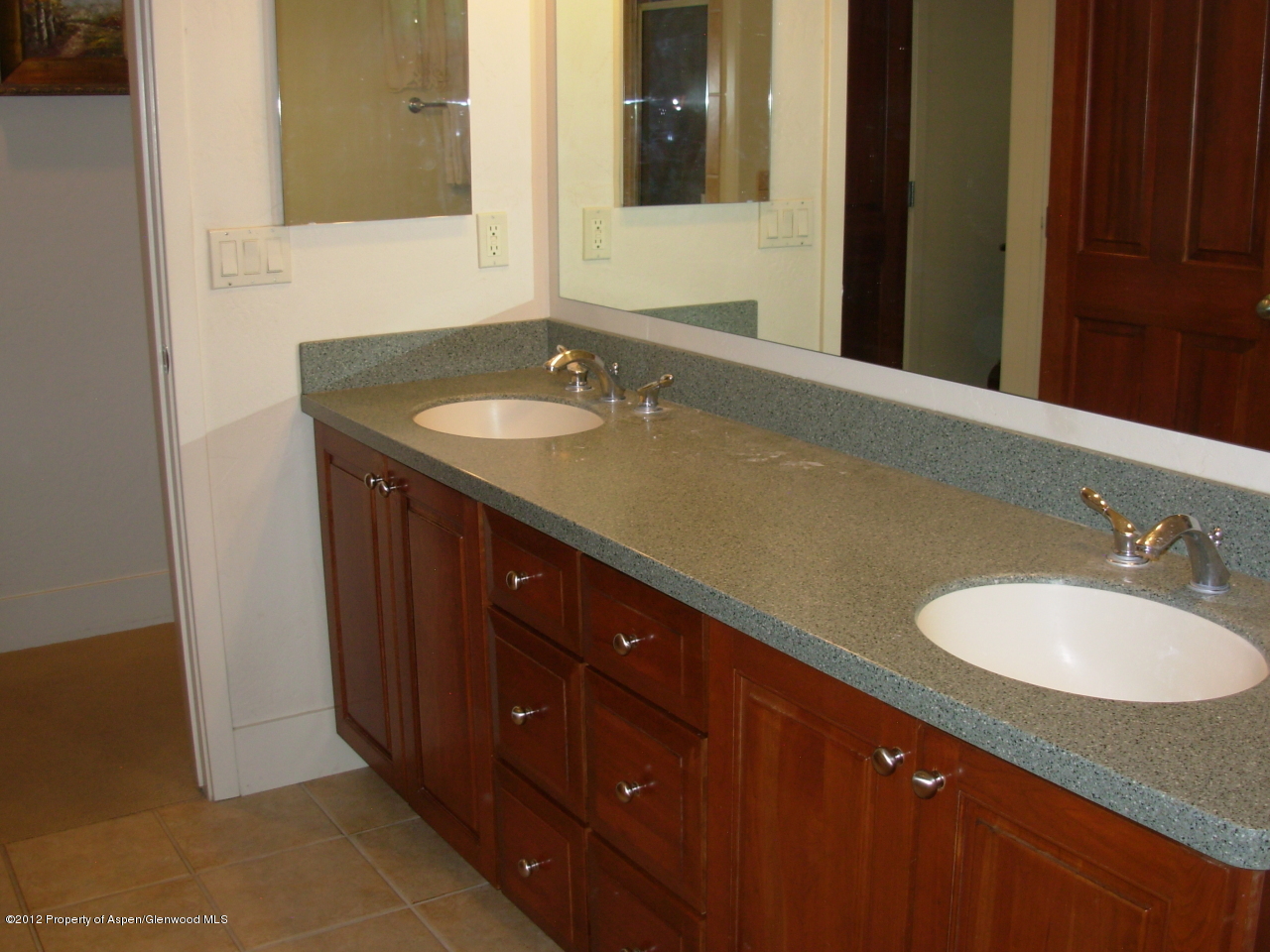 405 Meadow Court Basalt, CO 81621 - Photo 20 of 25 a bathroom with a sink and a mirror