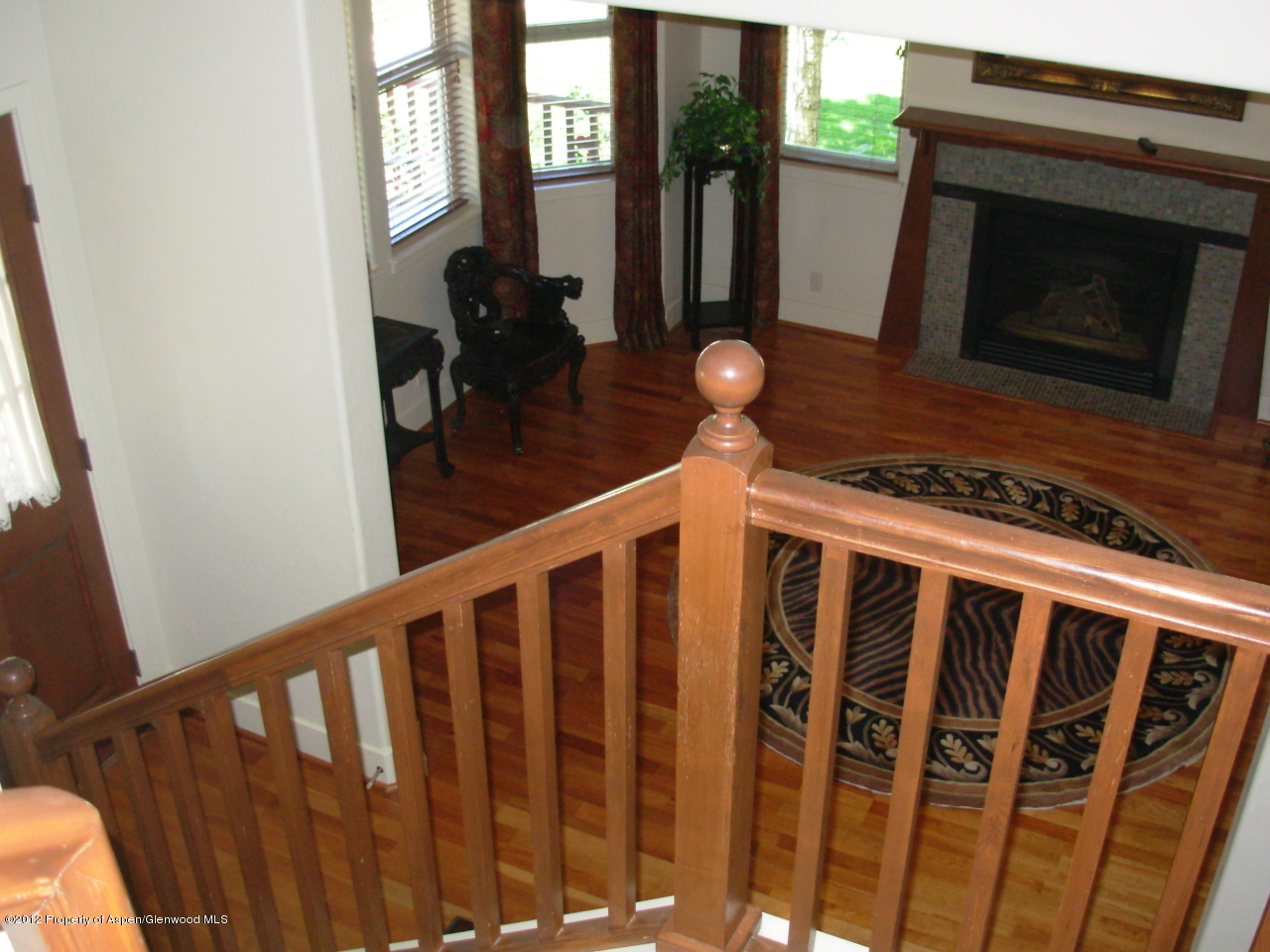 405 Meadow Court Basalt, CO 81621 - Photo 22 of 25 a view of entryway and hall with wooden floor