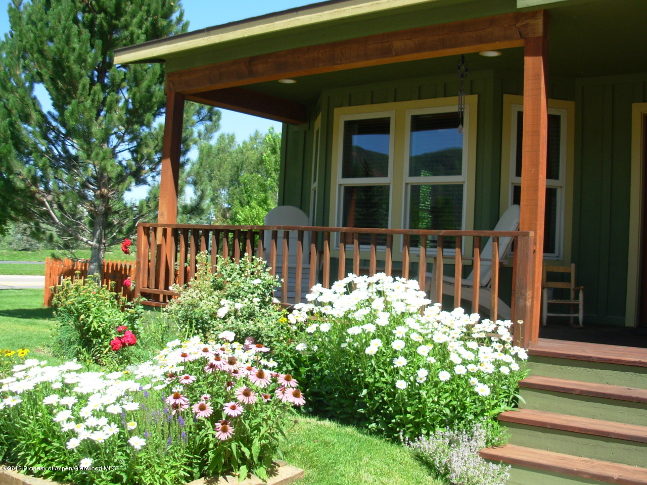 405 Meadow Court Basalt, CO 81621 - Photo 5 of 25 a front view of a house with a yard
