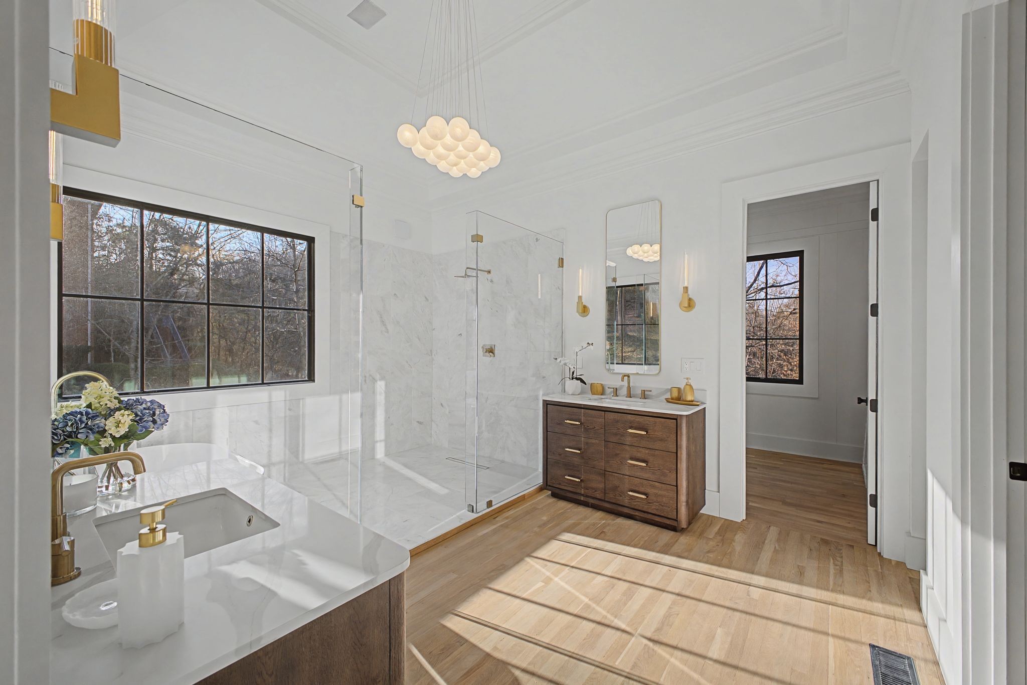 6339 Johnson Chapel Road West Brentwood, TN 37027 - Photo 24 of 82 a spacious bathroom with a tub sink and mirror