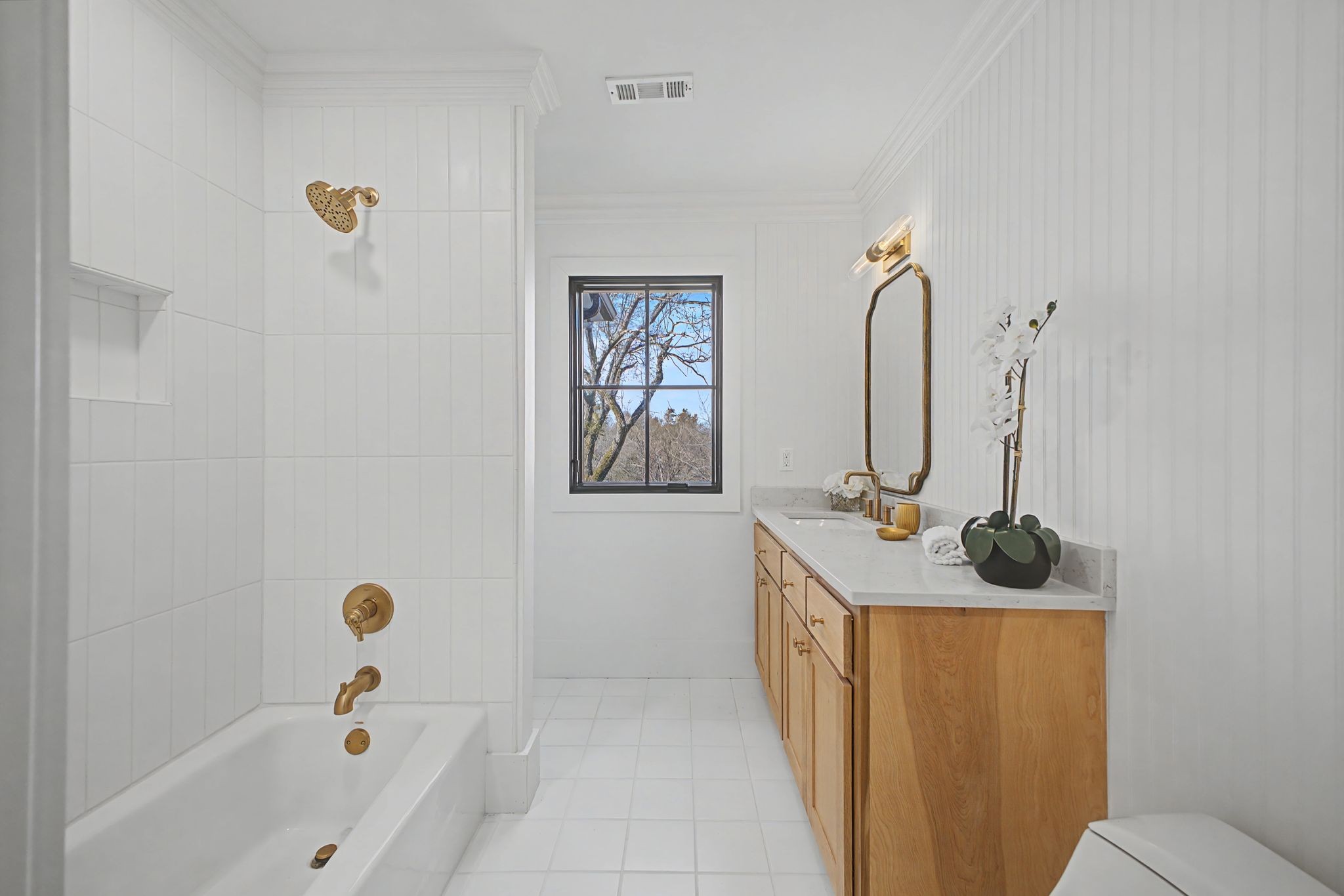 6339 Johnson Chapel Road West Brentwood, TN 37027 - Photo 44 of 82 a bathroom with a tub sink and mirror