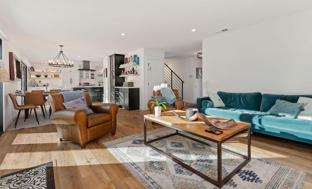 a living room with furniture and a couch