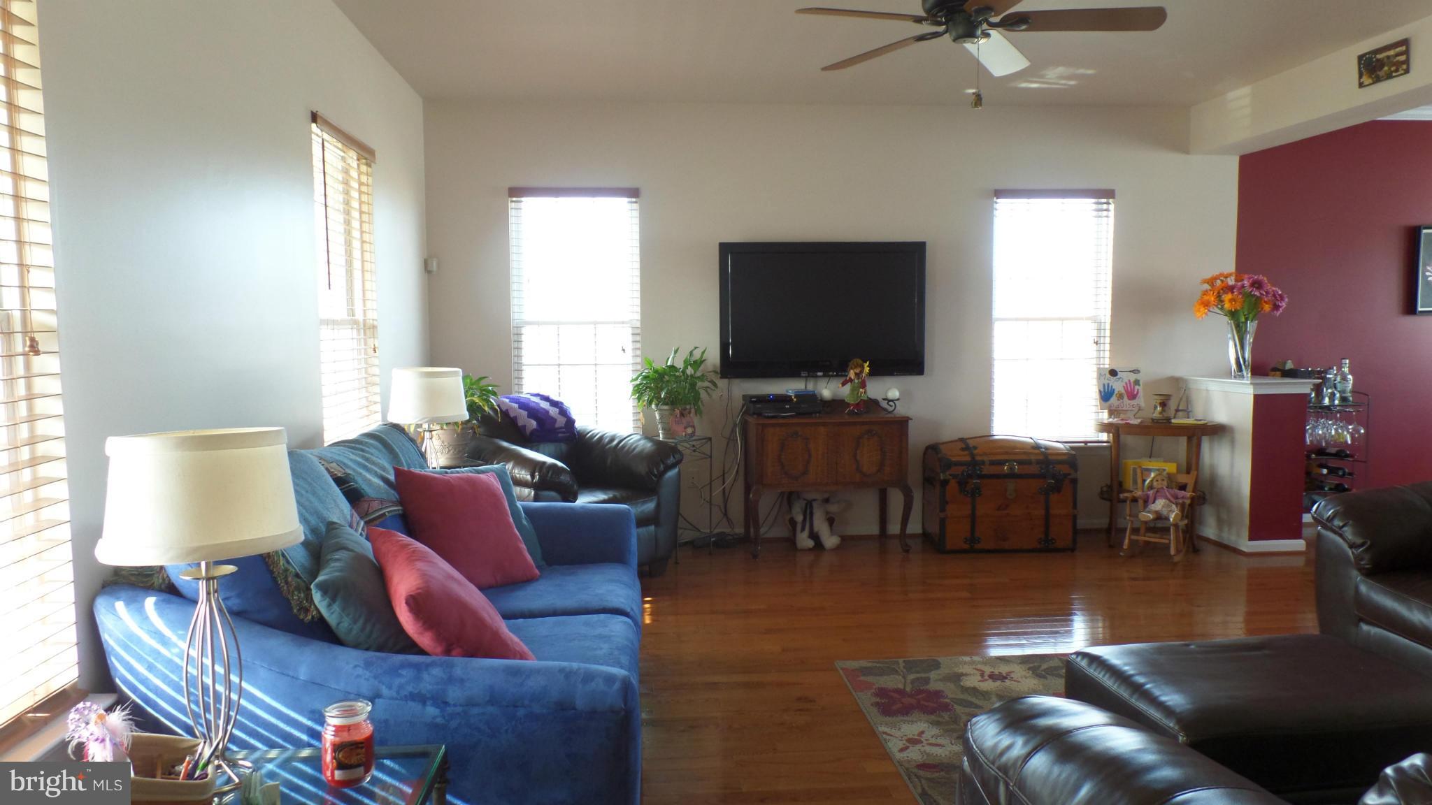 126 Commodore Drive Baltimore, MD 21221 - Photo 4 of 30 Living Room w/ Hardwood Floors