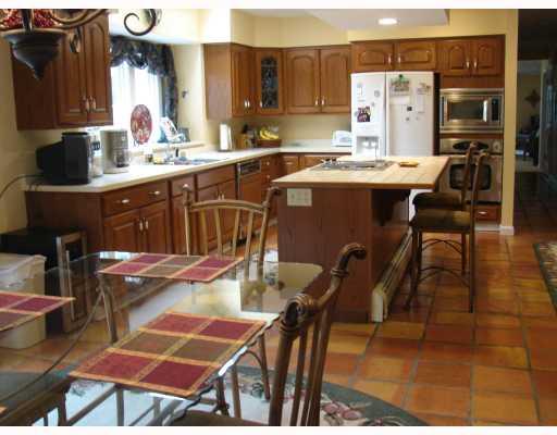 459 Three Degree Road Renfrew, PA 16053 - Photo 10 of 18 Kitchen. Large kitchen island with built-in cooktop & down-draft system