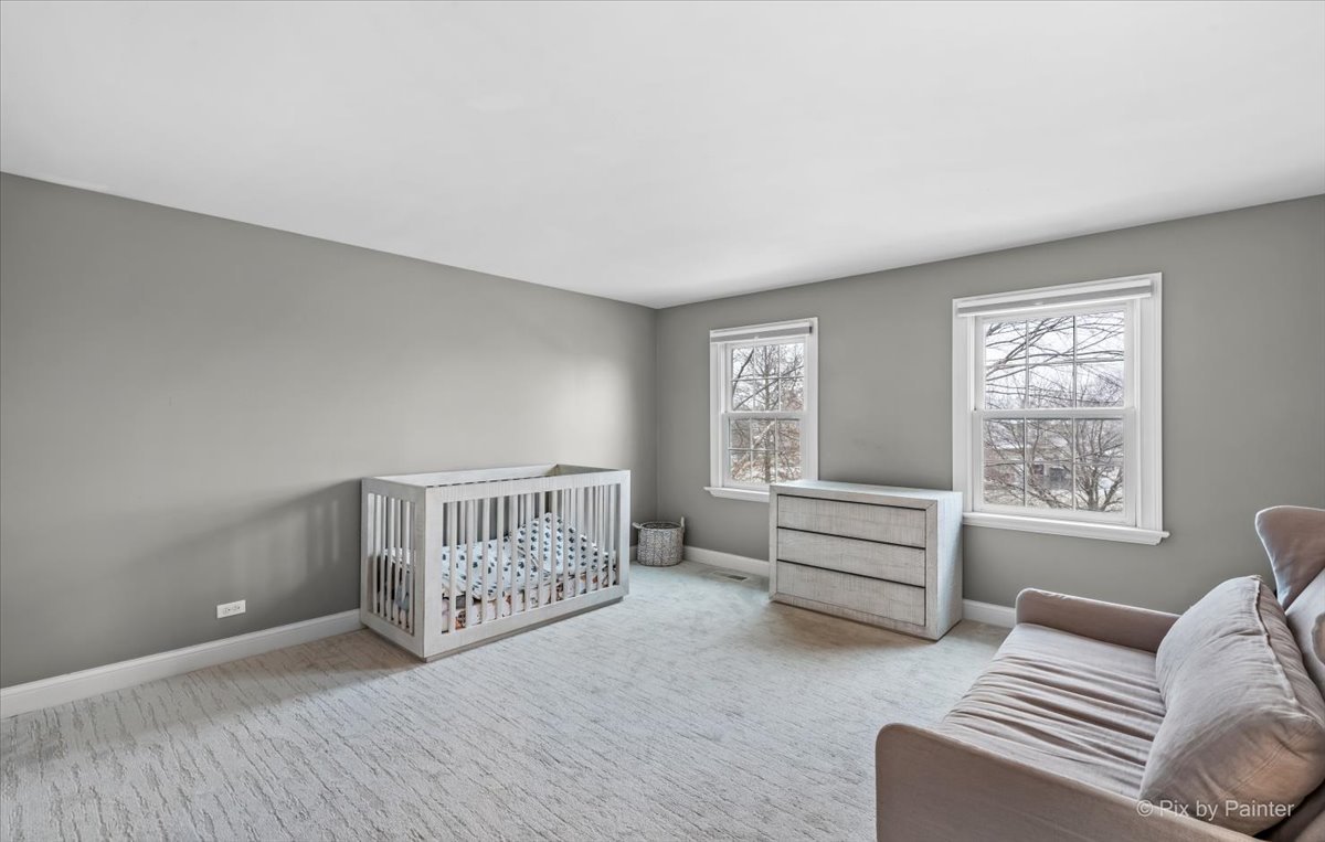 7N580 Wagontire Road St. Charles, IL 60175 - Photo 27 of 52 a bedroom with furniture and a window