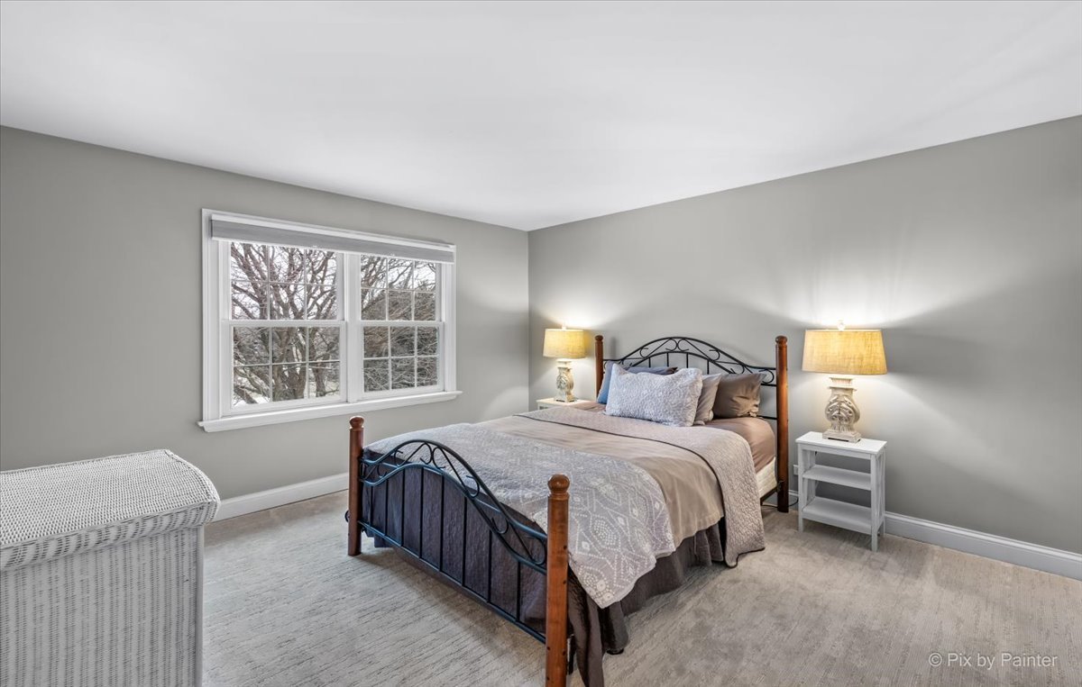 7N580 Wagontire Road St. Charles, IL 60175 - Photo 28 of 52 a bedroom with a bed and a window