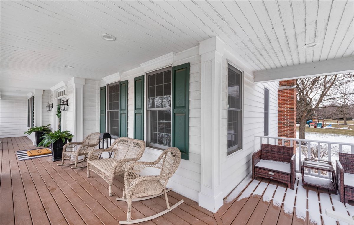 7N580 Wagontire Road St. Charles, IL 60175 - Photo 3 of 52 a view of balcony with furniture and wooden floor