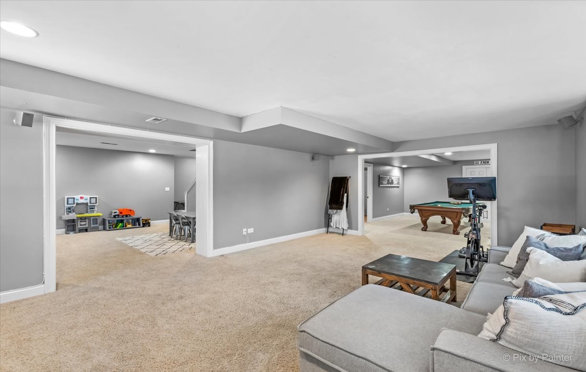 7N580 Wagontire Road St. Charles, IL 60175 - Photo 32 of 52 a living room with furniture and a table