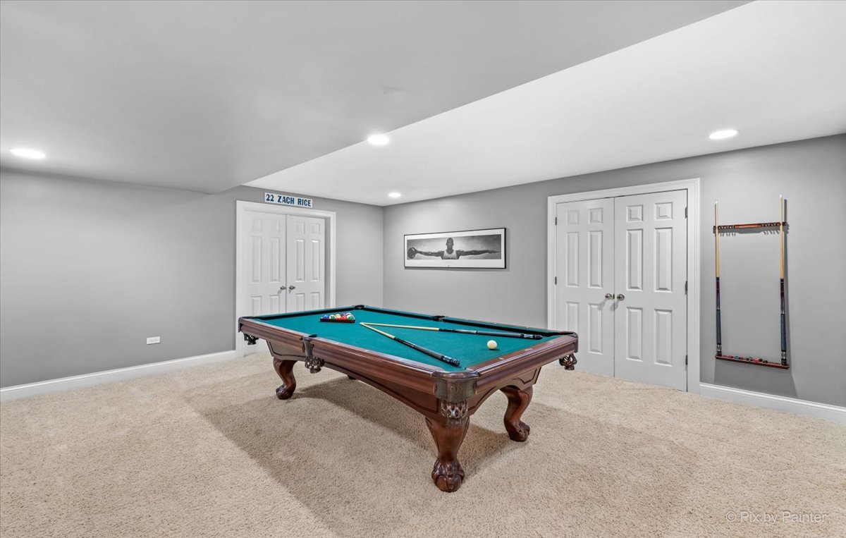 7N580 Wagontire Road St. Charles, IL 60175 - Photo 34 of 52 a room with pool table and wooden floor
