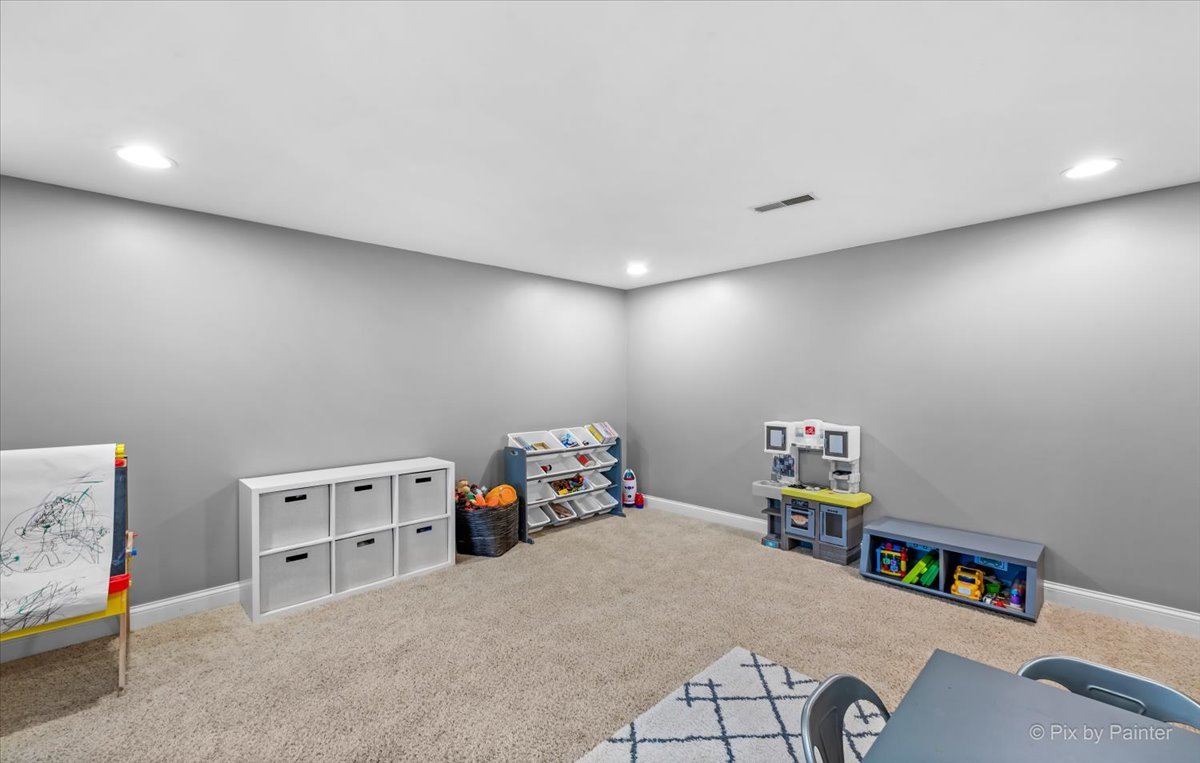 7N580 Wagontire Road St. Charles, IL 60175 - Photo 35 of 52 a bedroom with furniture and a book shelf