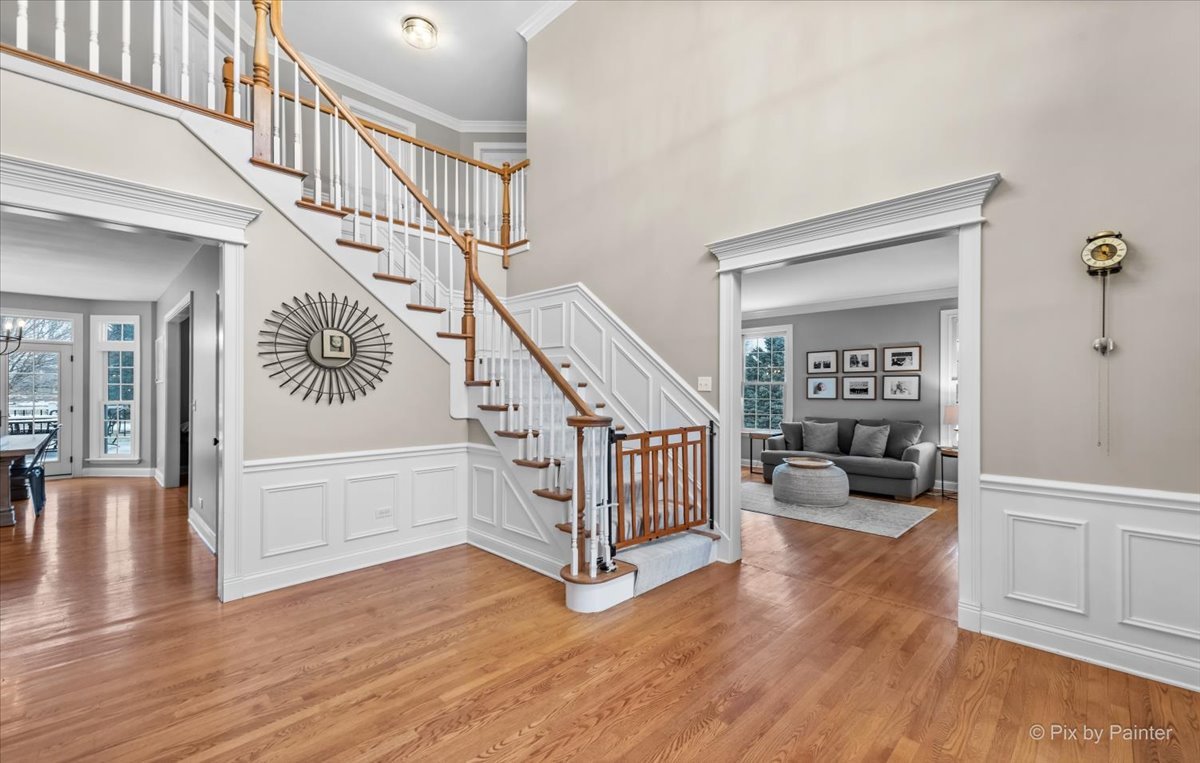 7N580 Wagontire Road St. Charles, IL 60175 - Photo 4 of 52 a view of entryway and hall with wooden floor