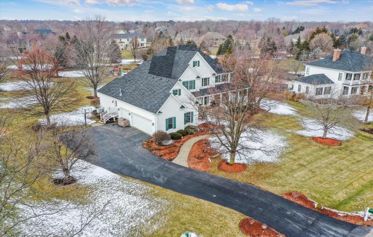 7N580 Wagontire Road St. Charles, IL 60175 - Photo 49 of 52 a view of a house with a yard