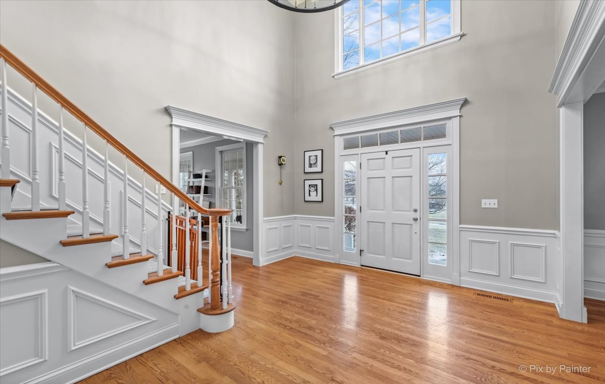7N580 Wagontire Road St. Charles, IL 60175 - Photo 5 of 52 a view of entryway and hall with wooden floor