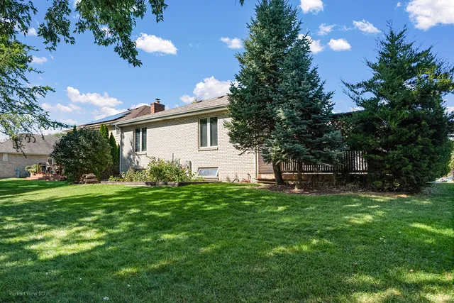 a house view with a garden space