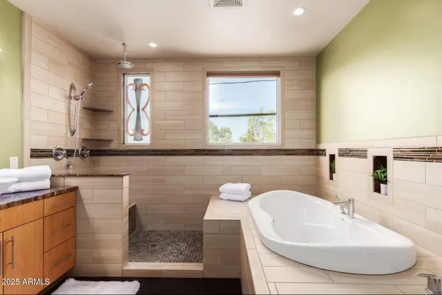 a view of a kitchen with washer and dryer