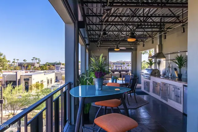a view of a dining room with furniture and window