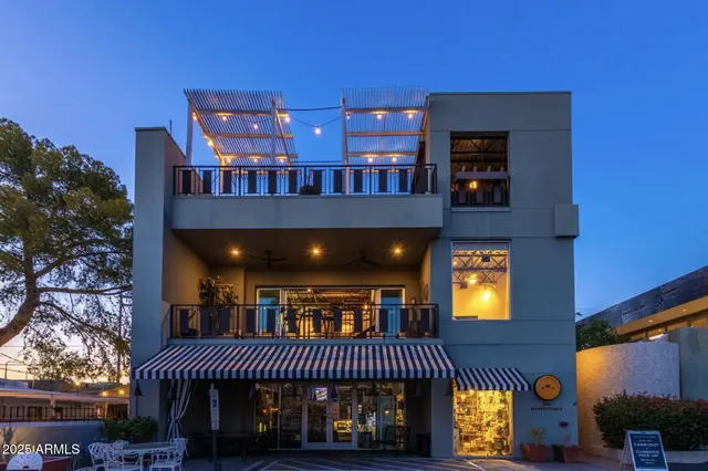 a view of a building with a street
