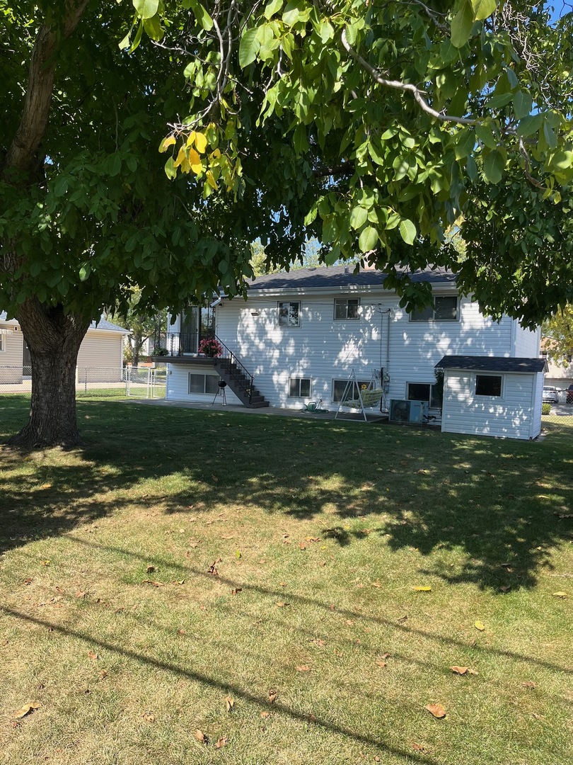 433 West Diversey Avenue Addison, IL 60101 - Photo 8 of 8 a view of a house with a yard