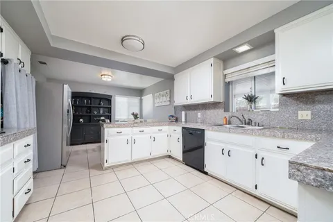 a bathroom with a sink double vanity and a mirror