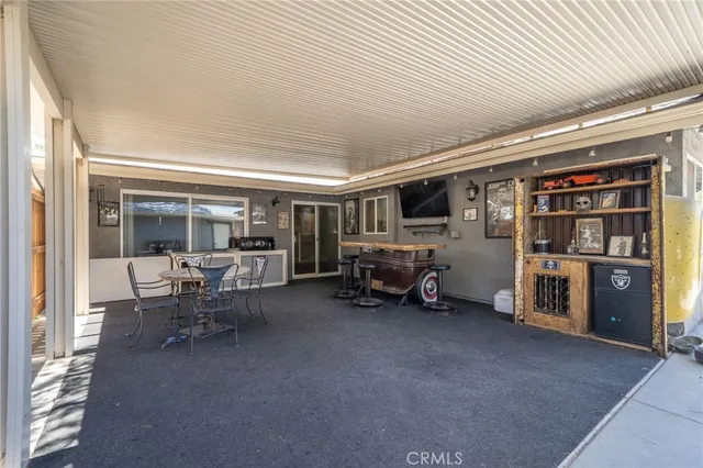 a view of a house with a snow in the yard