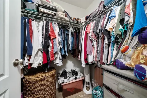 a view of a porch with a table and chairs