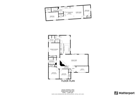 a view of a house with a backyard