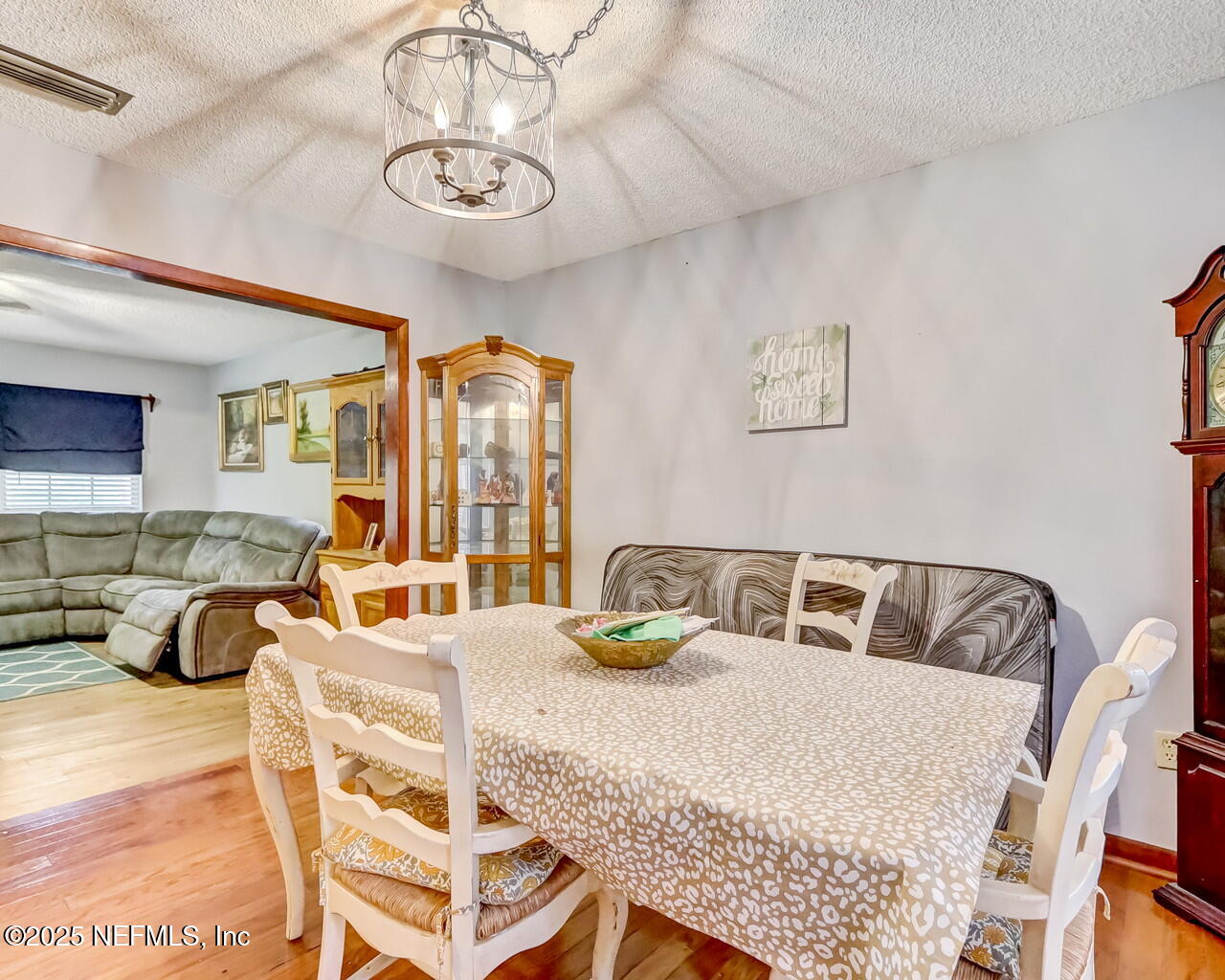 43059 Pearl Lane Callahan, FL 32011 - Photo 11 of 42 a bedroom with a bed and ceiling fan