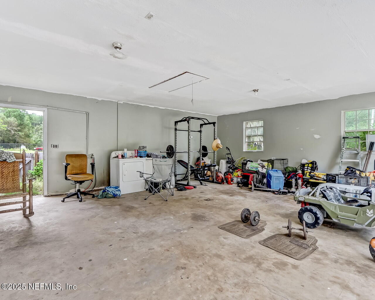 43059 Pearl Lane Callahan, FL 32011 - Photo 33 of 42 a view of a room with gym equipment