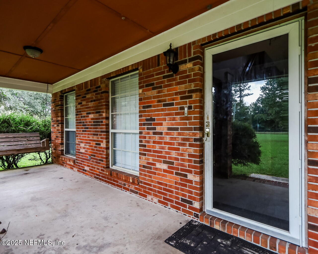 43059 Pearl Lane Callahan, FL 32011 - Photo 5 of 42 a view of front door of house