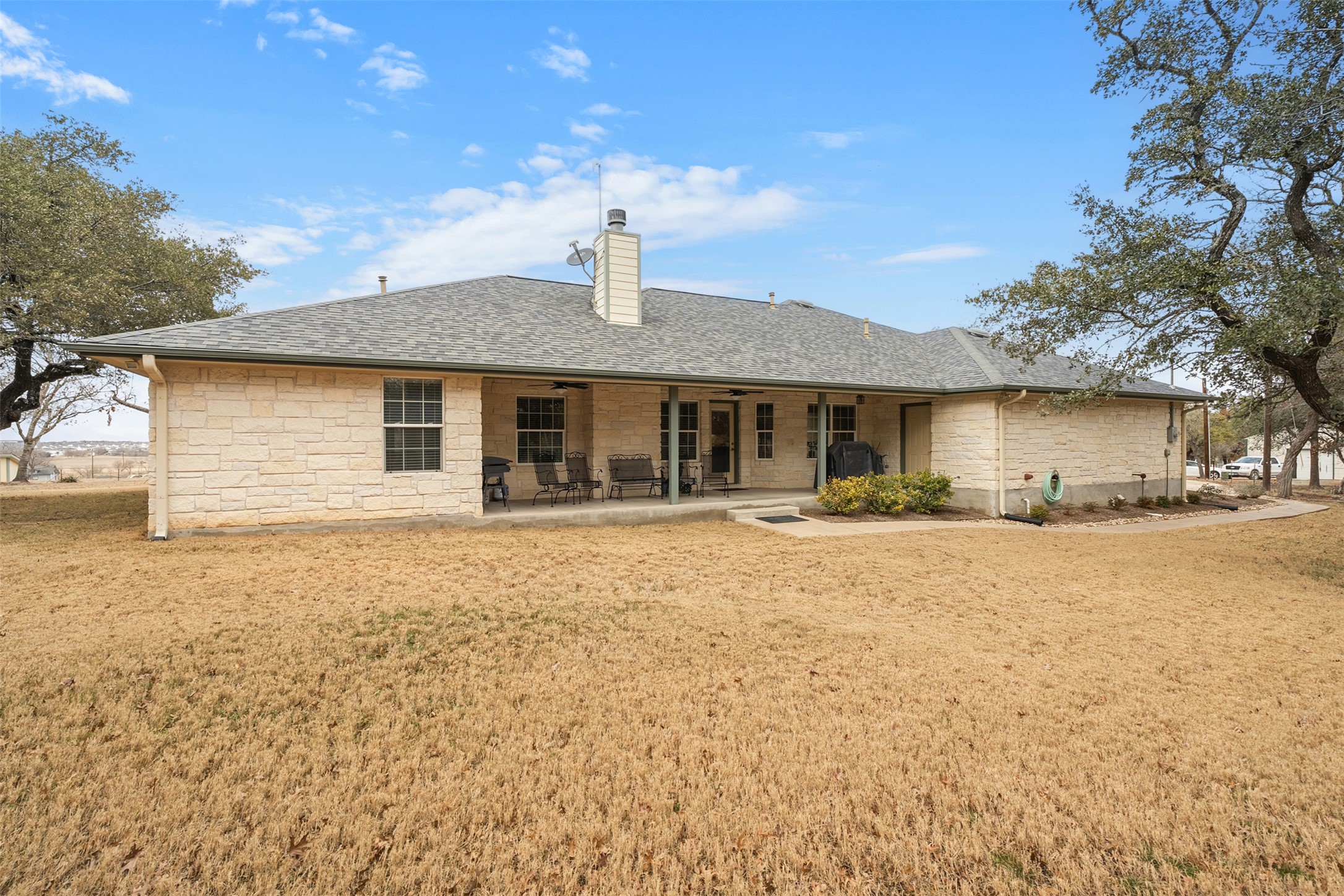 420 Rundberg Drive Jarrell, TX 76537 - Photo 20 of 27 Rear view of house