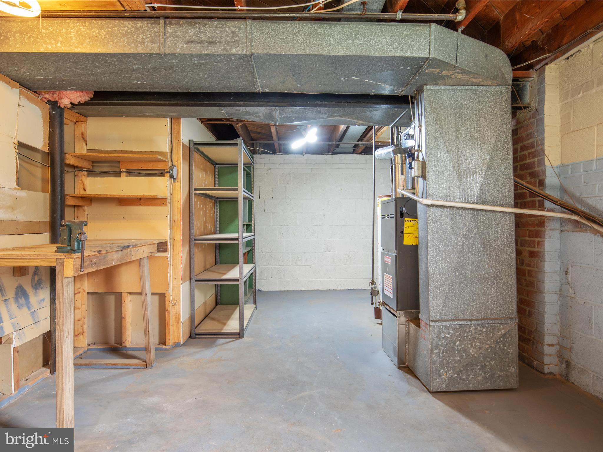 7517 Inzer Street Springfield, VA 22151 - Photo 30 of 33 LOWER LEVEL WORKSHOP, STORAGE AND UTILITY ROOM