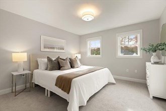 22 Barracks Road, Unit 22 Hudson, MA 01749 - Photo 12 of 15 a bedroom with double bed and a window