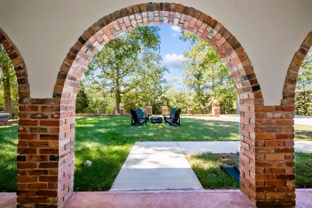 a bedroom with furniture and window