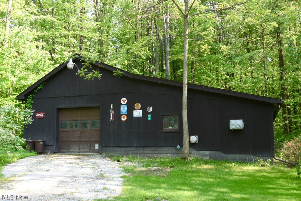 15937 Thompson Road Thompson, OH 44086 - Photo 23 of 25 This heated added bonus barn holds your vehicle and a large workshop/hobby area/car/barn storage.