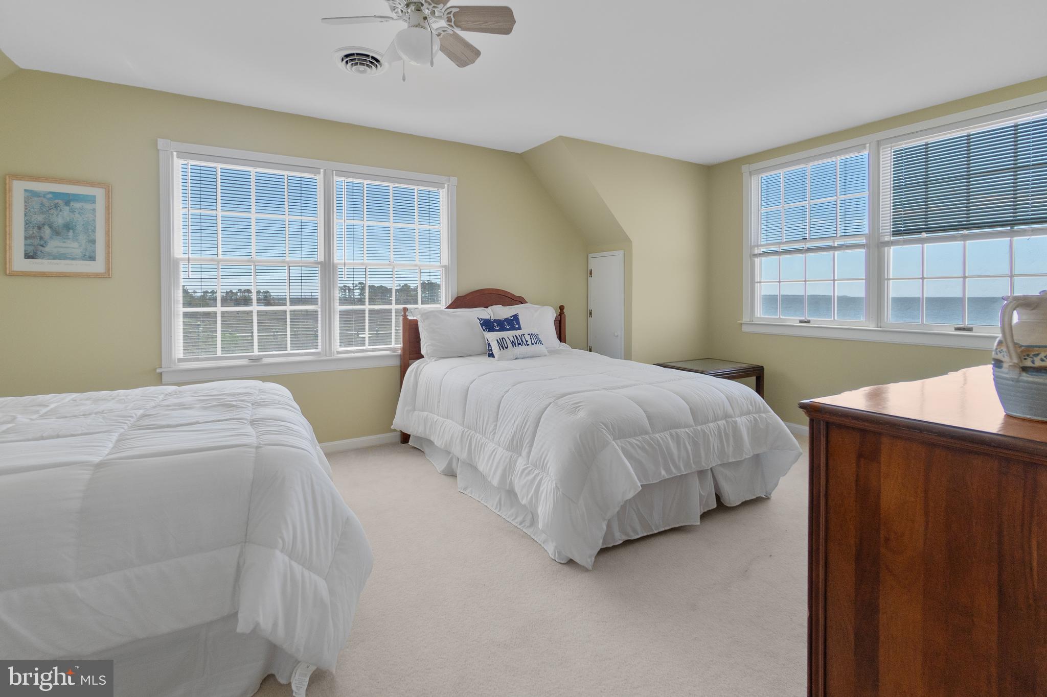 20128 Nanticoke Road Nanticoke, MD 21840 - Photo 65 of 70 a bedroom with a bed and a window