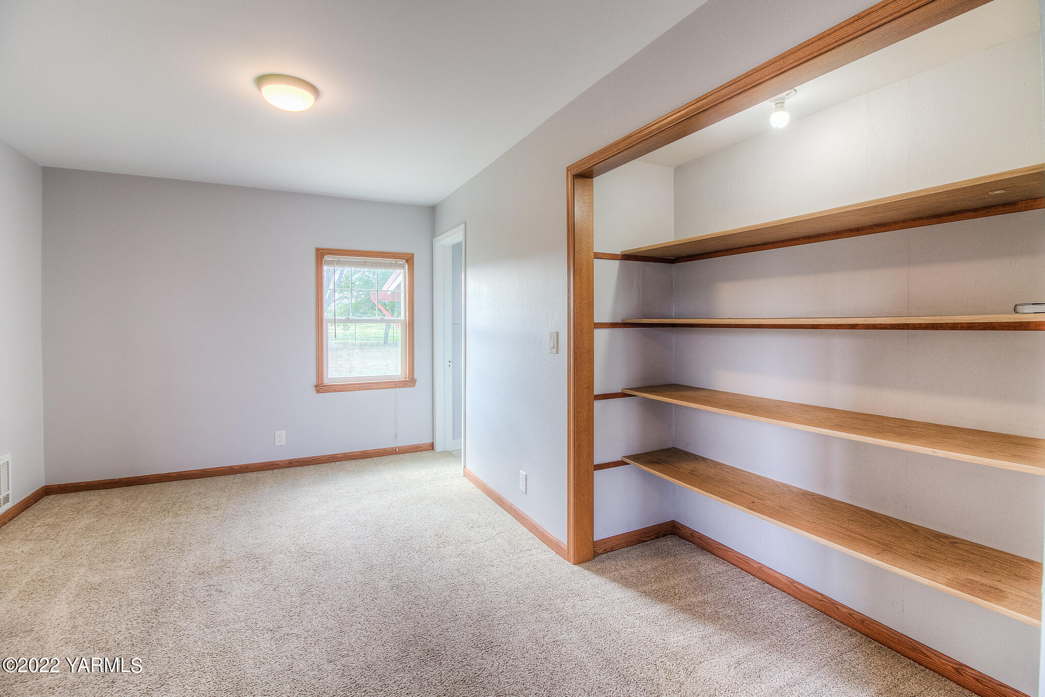 1212 Dazet Road Yakima, WA 98908 - Photo 11 of 37 a view of an empty room with a window