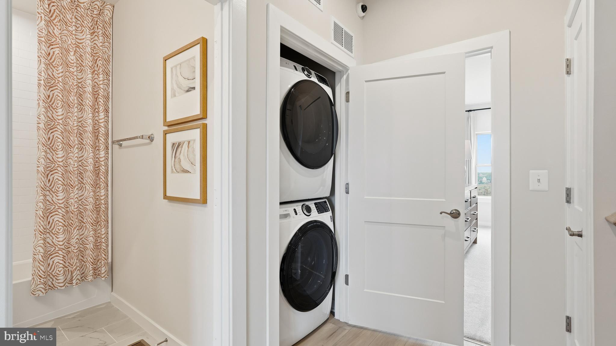 17397 Walnut Grove Way Dumfries, VA 22026 - Photo 33 of 51 a utility room with dryer and washer