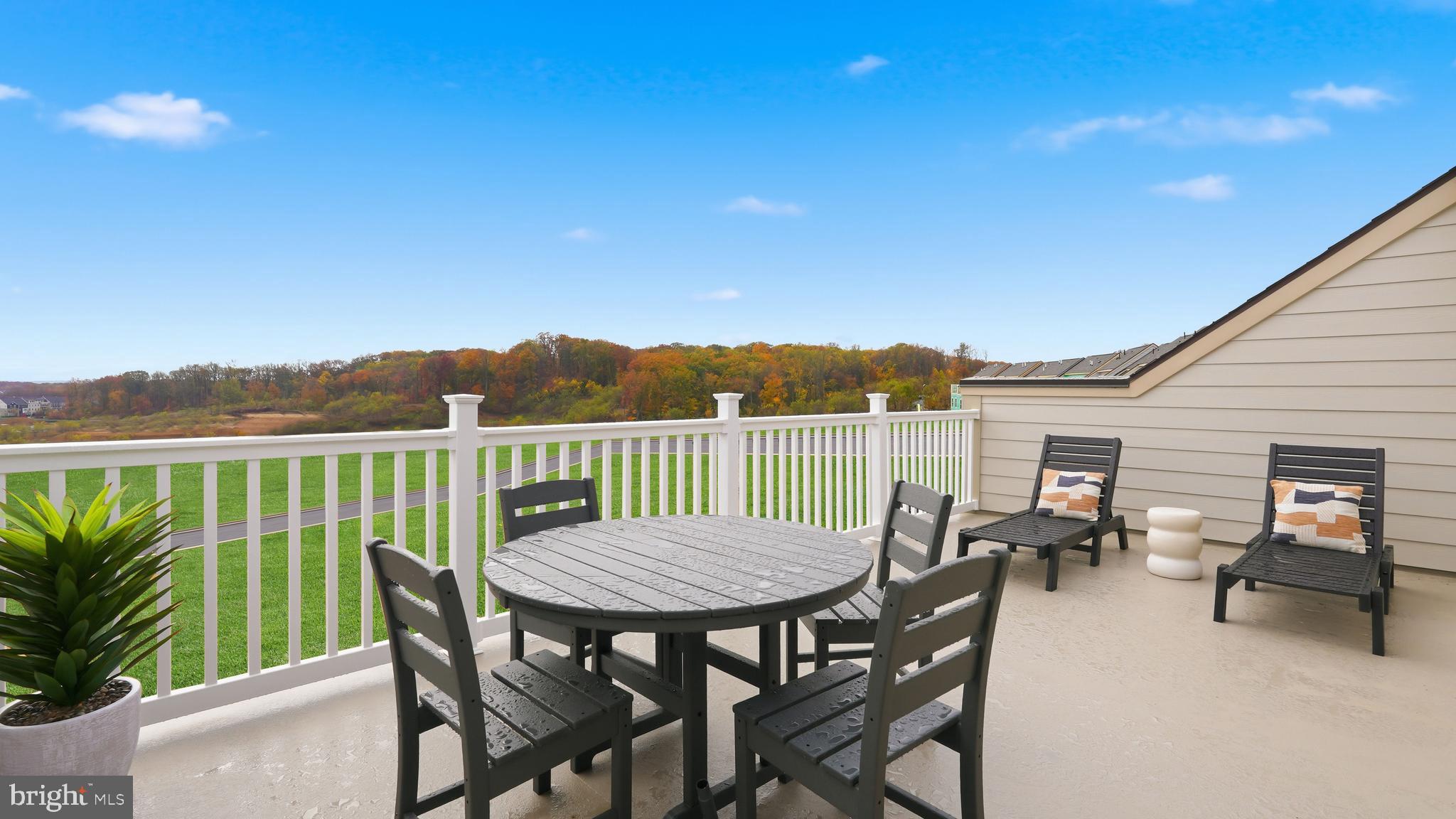 17397 Walnut Grove Way Dumfries, VA 22026 - Photo 37 of 51 a view of a chairs and table in patio