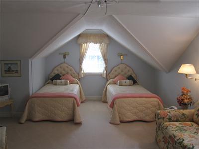 47 Cairn Ridge Road East Falmouth, MA 02536 - Photo 11 of 19 a bedroom with two beds and a window