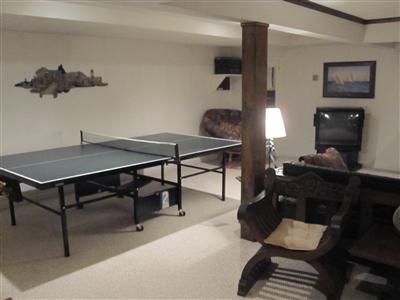 47 Cairn Ridge Road East Falmouth, MA 02536 - Photo 14 of 19 a workspace with furniture and wooden floor
