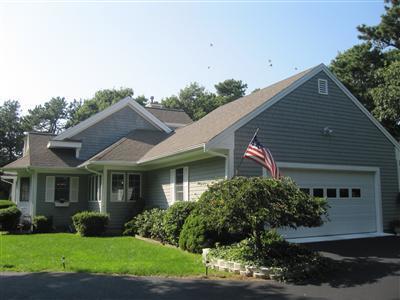 47 Cairn Ridge Road East Falmouth, MA 02536 - Photo 16 of 19 a front view of a house with a yard