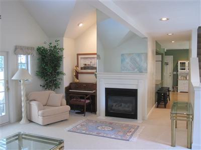 47 Cairn Ridge Road East Falmouth, MA 02536 - Photo 6 of 19 a living room with furniture and a fireplace