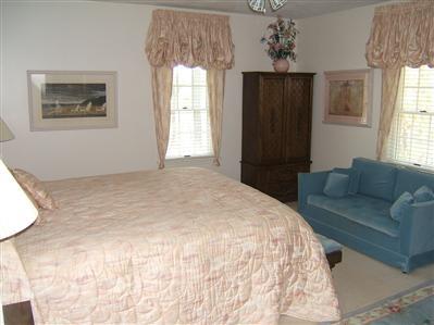47 Cairn Ridge Road East Falmouth, MA 02536 - Photo 10 of 19 a spacious bedroom with a bed and a window
