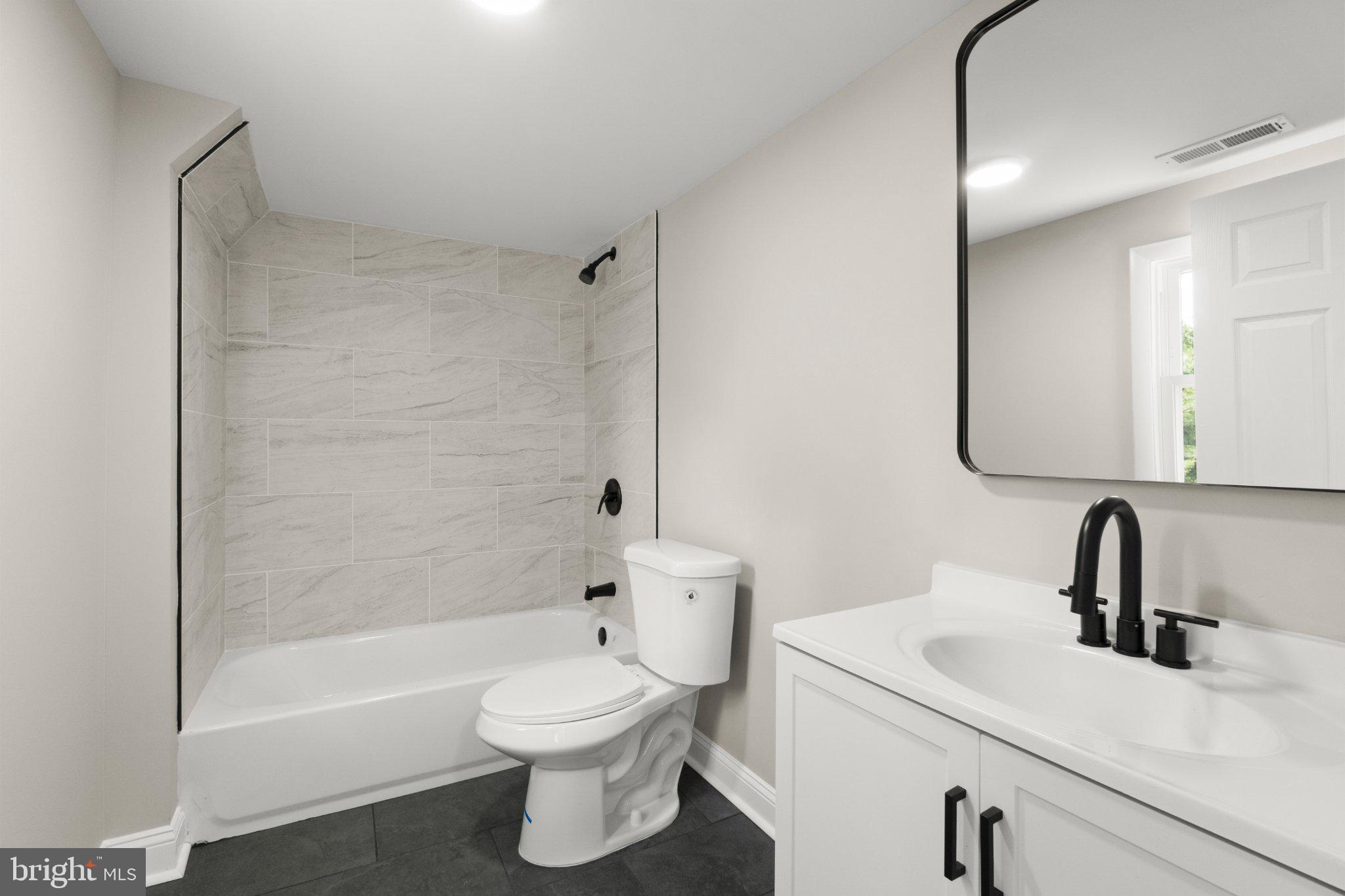 1551 South Main Road Vineland, NJ 08360 - Photo 13 of 24 Modern bathroom with sleek finishes.