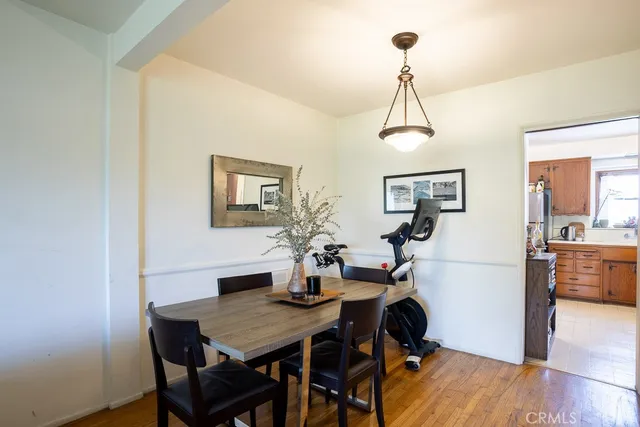 a kitchen with a refrigerator stove and sink