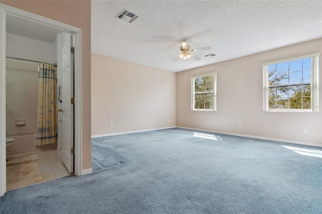 1209 Castleport Road Winter Garden, FL 34787 - Photo 20 of 36 a view of an empty room with a window